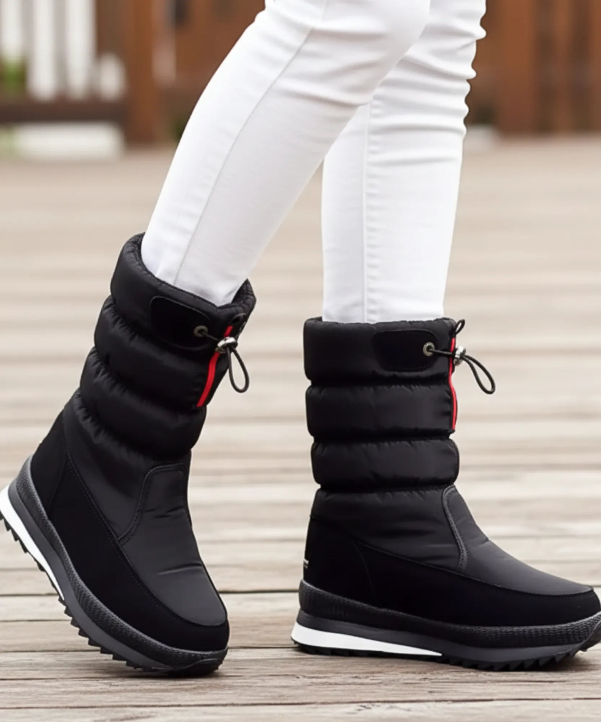Kira Schneestiefel Seitenreißverschluss Detailaufnahme schwarzer Puffer-Boot