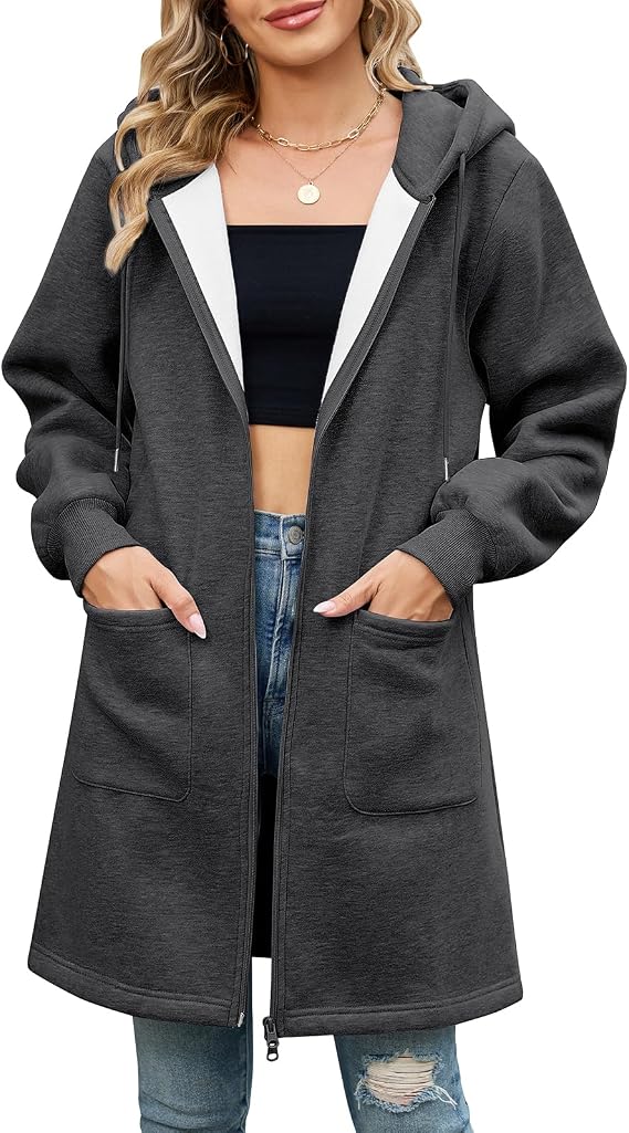 Elvienne Lange Kapuzenjacke kombiniert mit Jeans – Casuallook