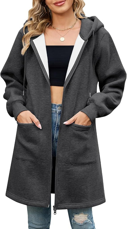 Elvienne Lange Kapuzenjacke kombiniert mit Jeans – Casuallook